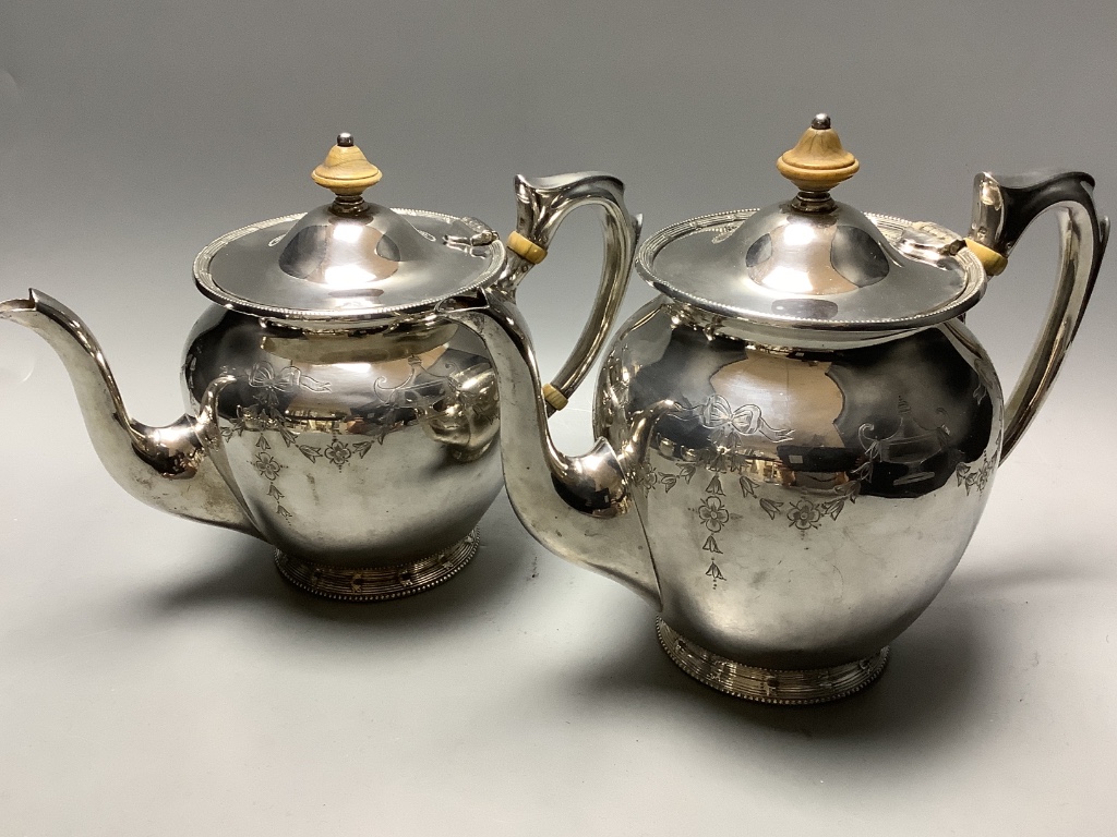 An Edwardian engraved silver four piece tea and coffee service